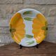 Round serving dish with hand-painted yellow flowers in ceramic TC Italy.