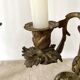 Pair of antique bronze candlesticks at the end of the table XIXth