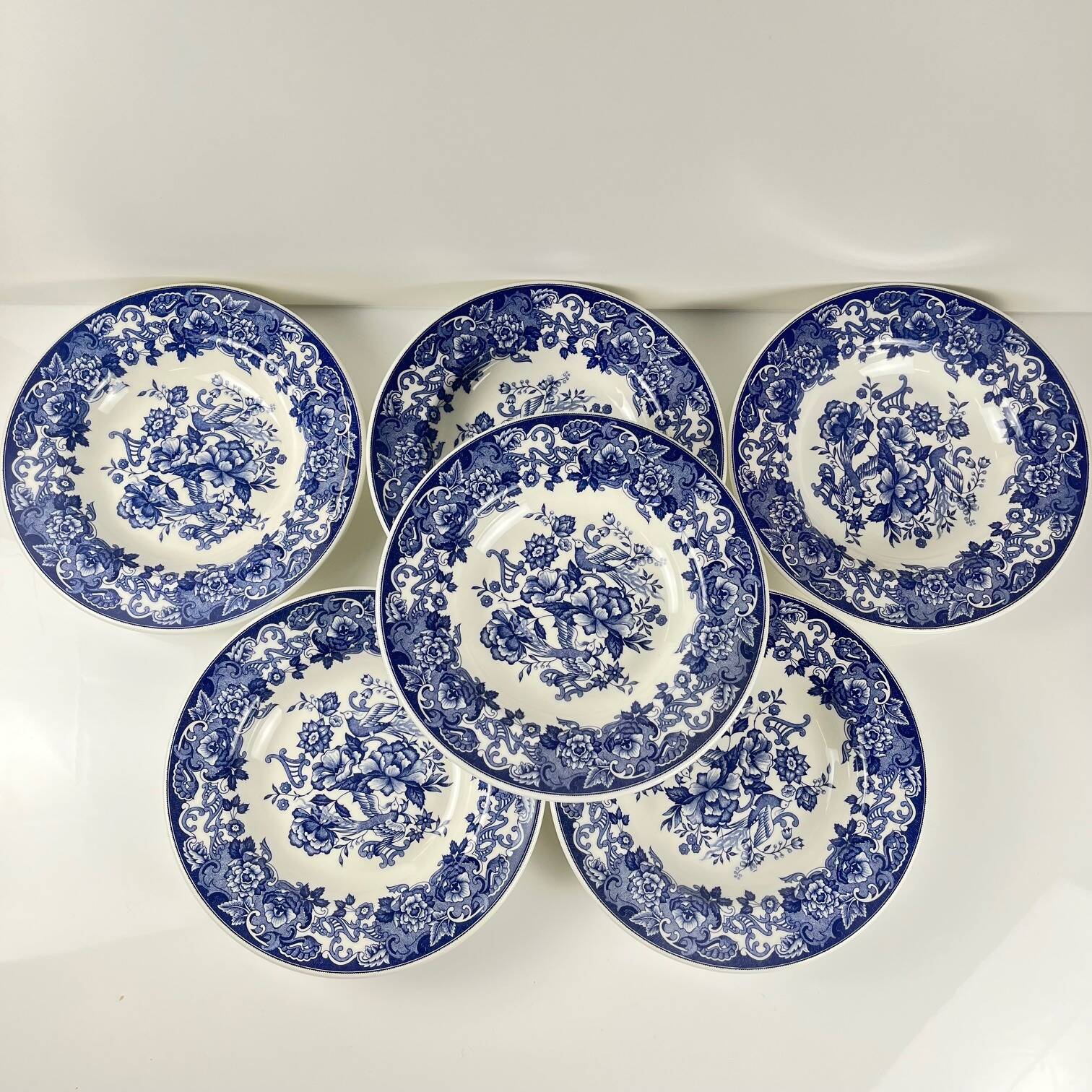 Set of 6 blue earthenware soup plates, floral and bird decoration, early