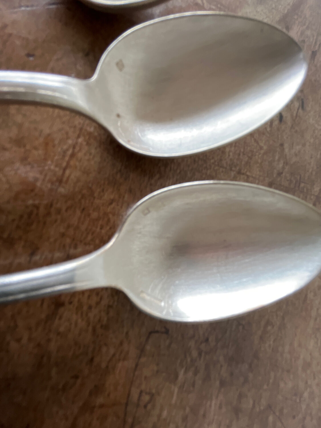 4 teaspoons in silver metal