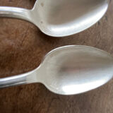4 teaspoons in silver metal
