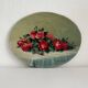 Old oil painting on oval wood with roses thrown from the 30s