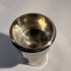 Metal candlestick by Jens Quistgaard for the brand Dansk Designs.