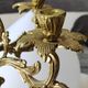 Old chandelier with 5 branches, decorated with Rinceaux, Louis XV / Rocaille style. In gilded bronze