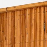 Split bamboo cabinet and engravings under glass 1960