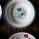 Lot 4 mismatched hollow plates Art Deco blue red green