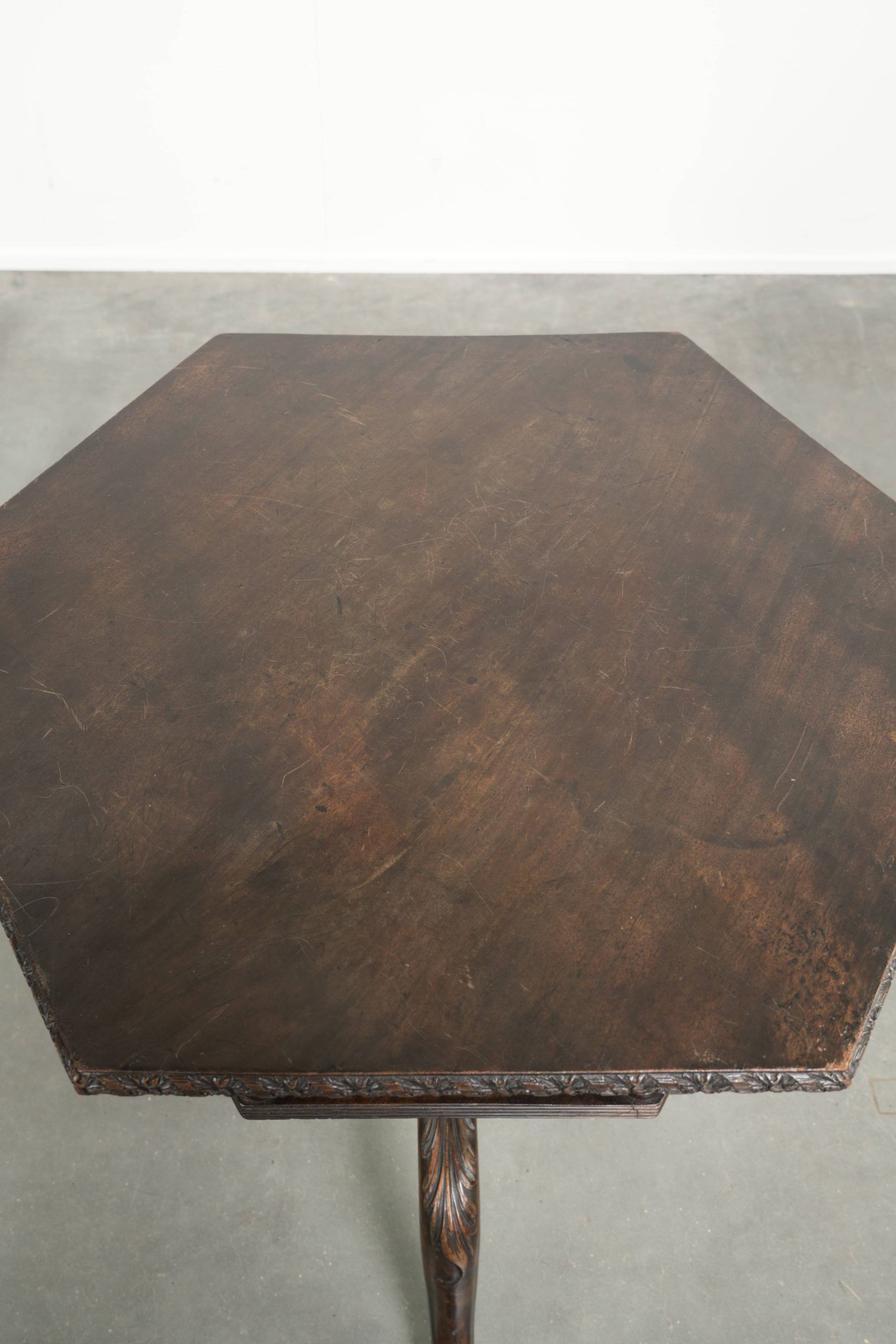 Antique wooden English rotating book table/side table from the 19th century