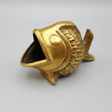 Old brass ashtray in the shape of a fish
