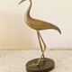 Vintage brass heron statue.
