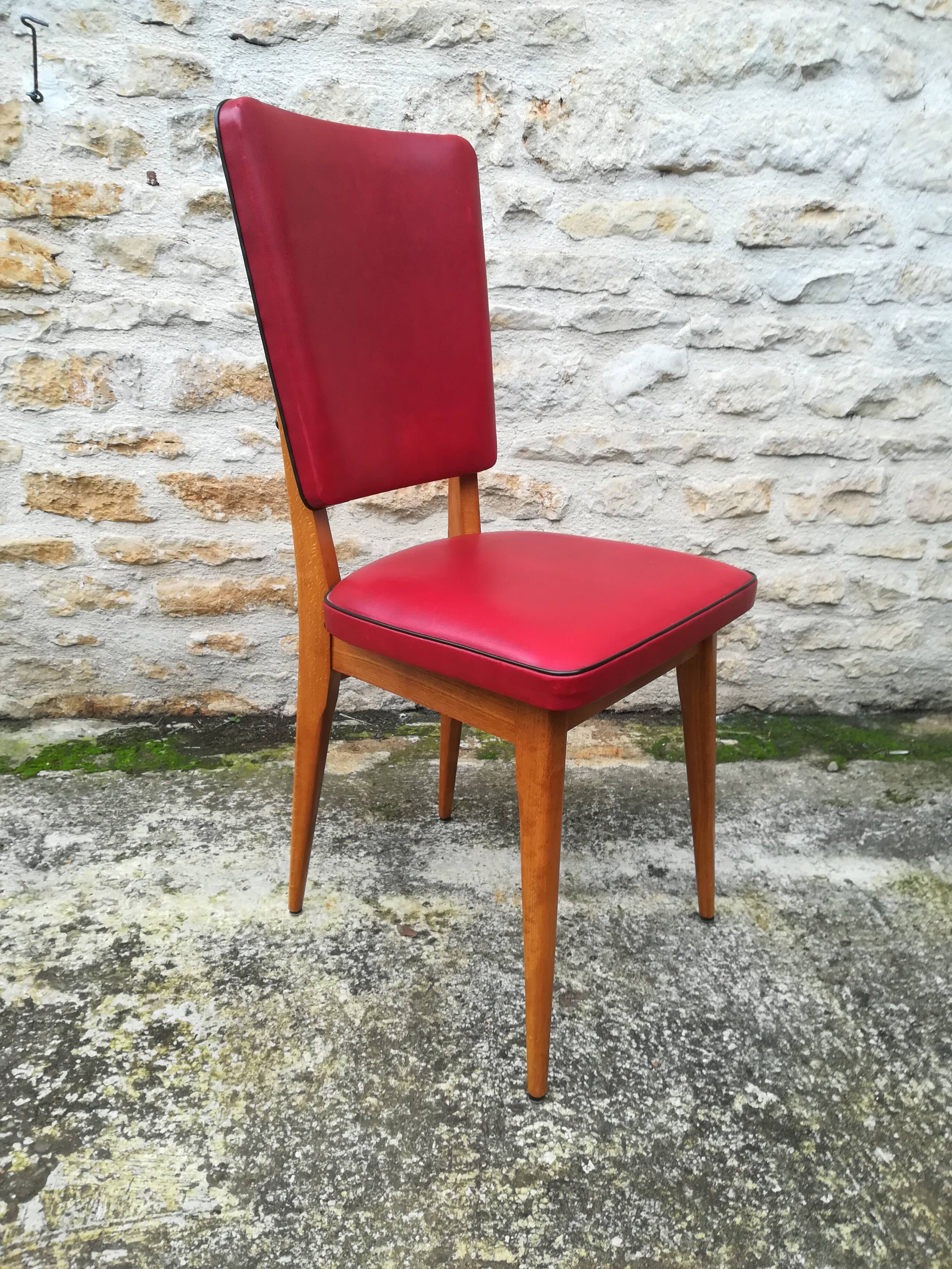 Chairs in red skaï
