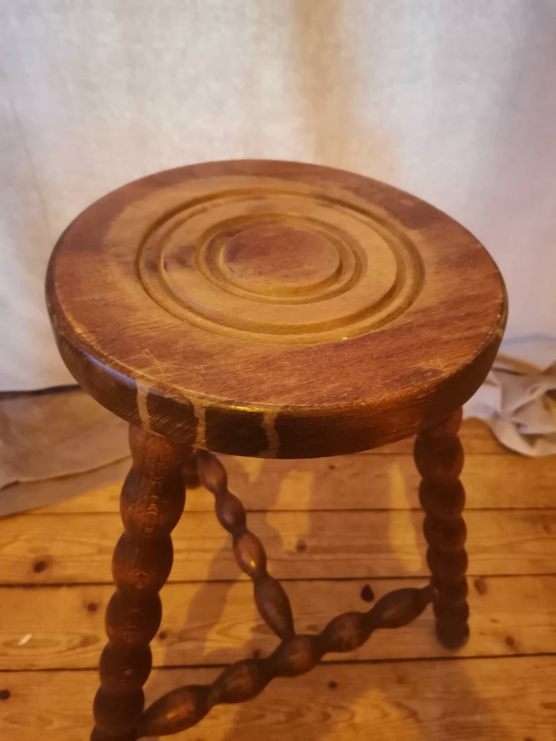 Turned wood tripod stool