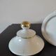 Pharmacy / apothecary pot in white earthenware decorated with gold net, "Catharan: Roseus signed Limoges