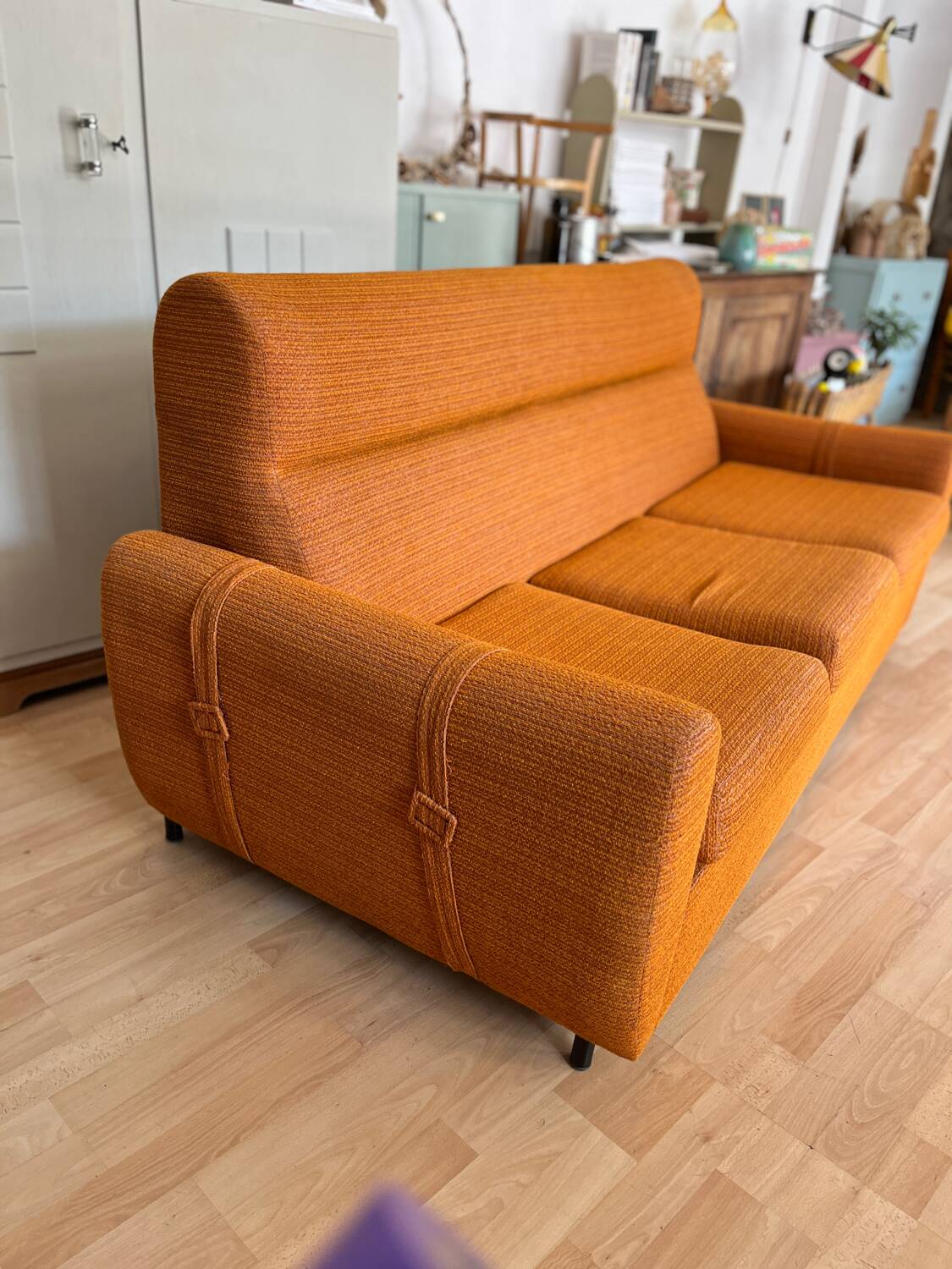 Vintage orange convertible sofa