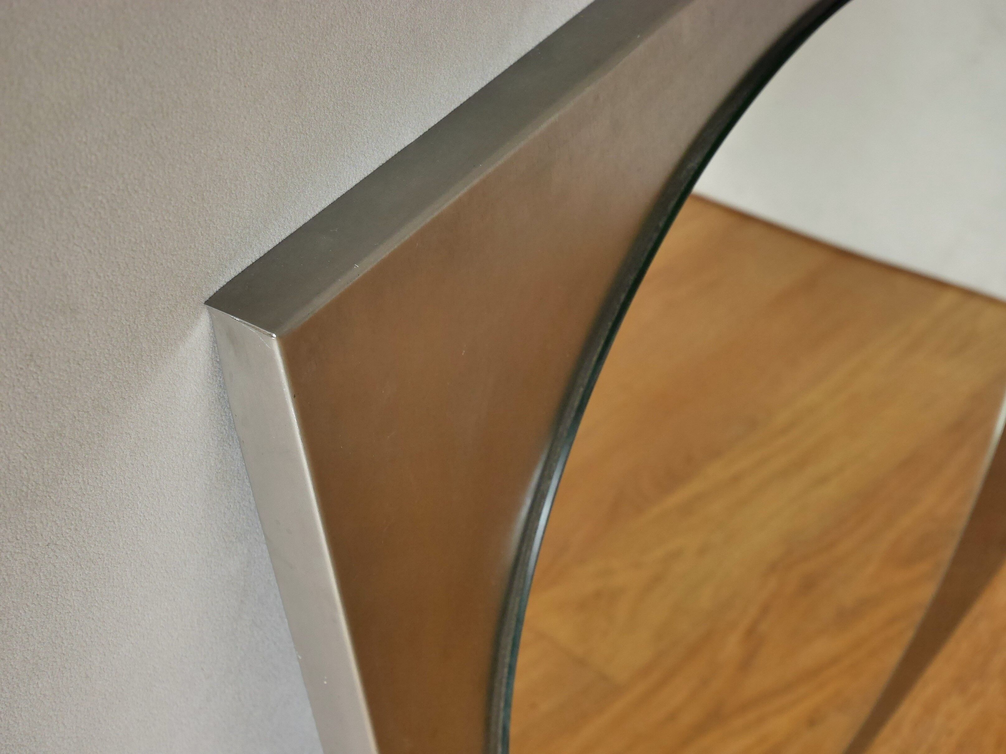 Round mirror with frame in stainless steel of the 1970s 60x60cm