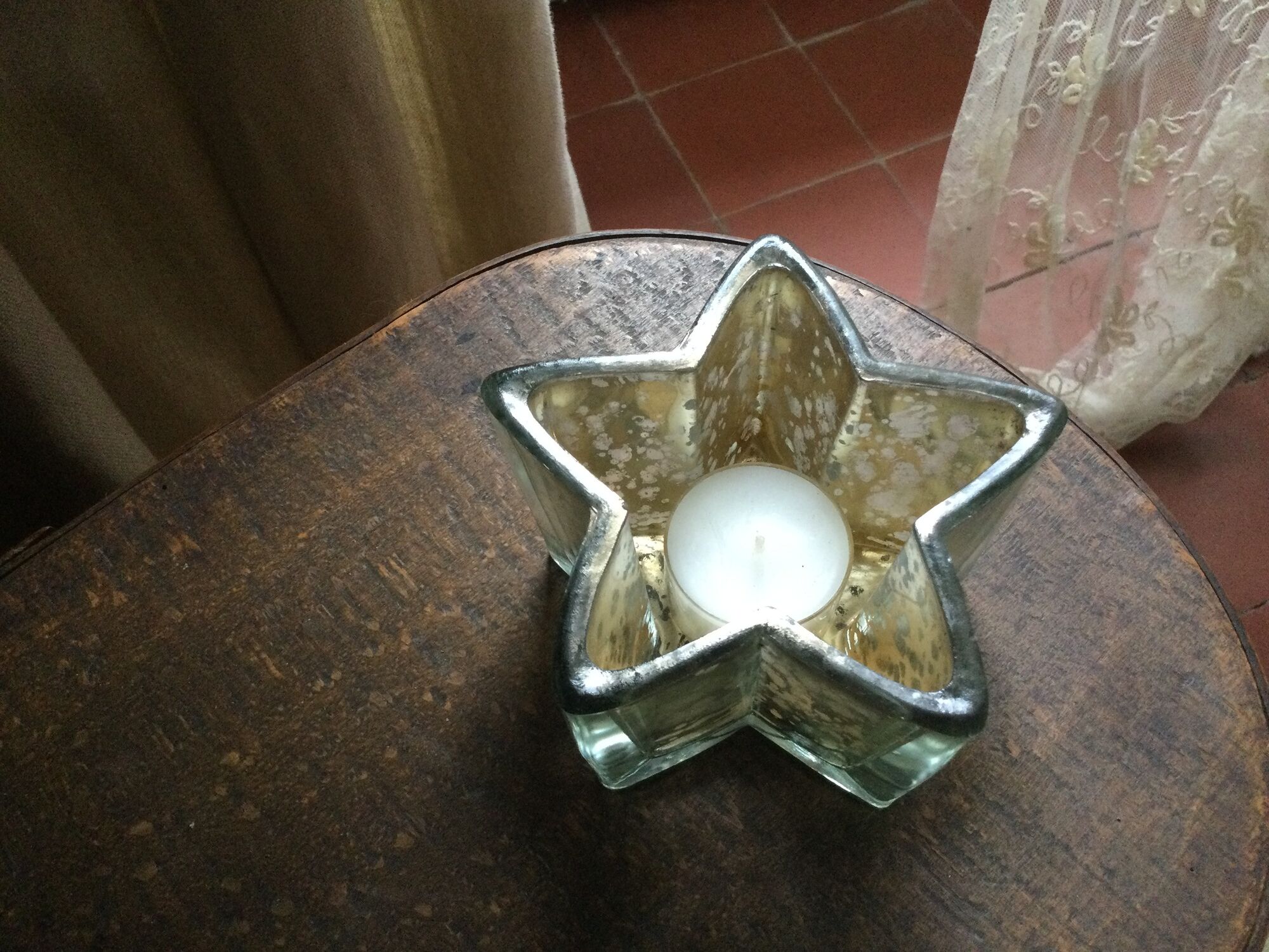 Pair of mercurized glass candle holders in the shape of stars