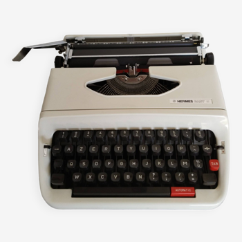 Vintage portable typewriter, white, functional, Hermes Baby S, new ribbon