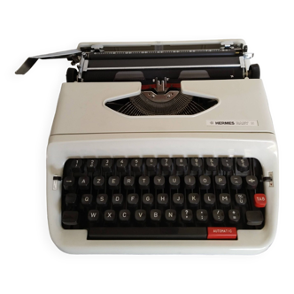 Vintage portable typewriter, white, functional, Hermes Baby S, new ribbon