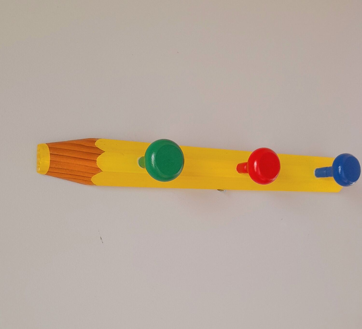 Pencil wall coat rack