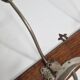 Antique wall-mounted coat rack in wood and metal with 4 hooks, 66 cm