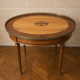 Louis XVI style bouillotte table in light wood and marquetry.