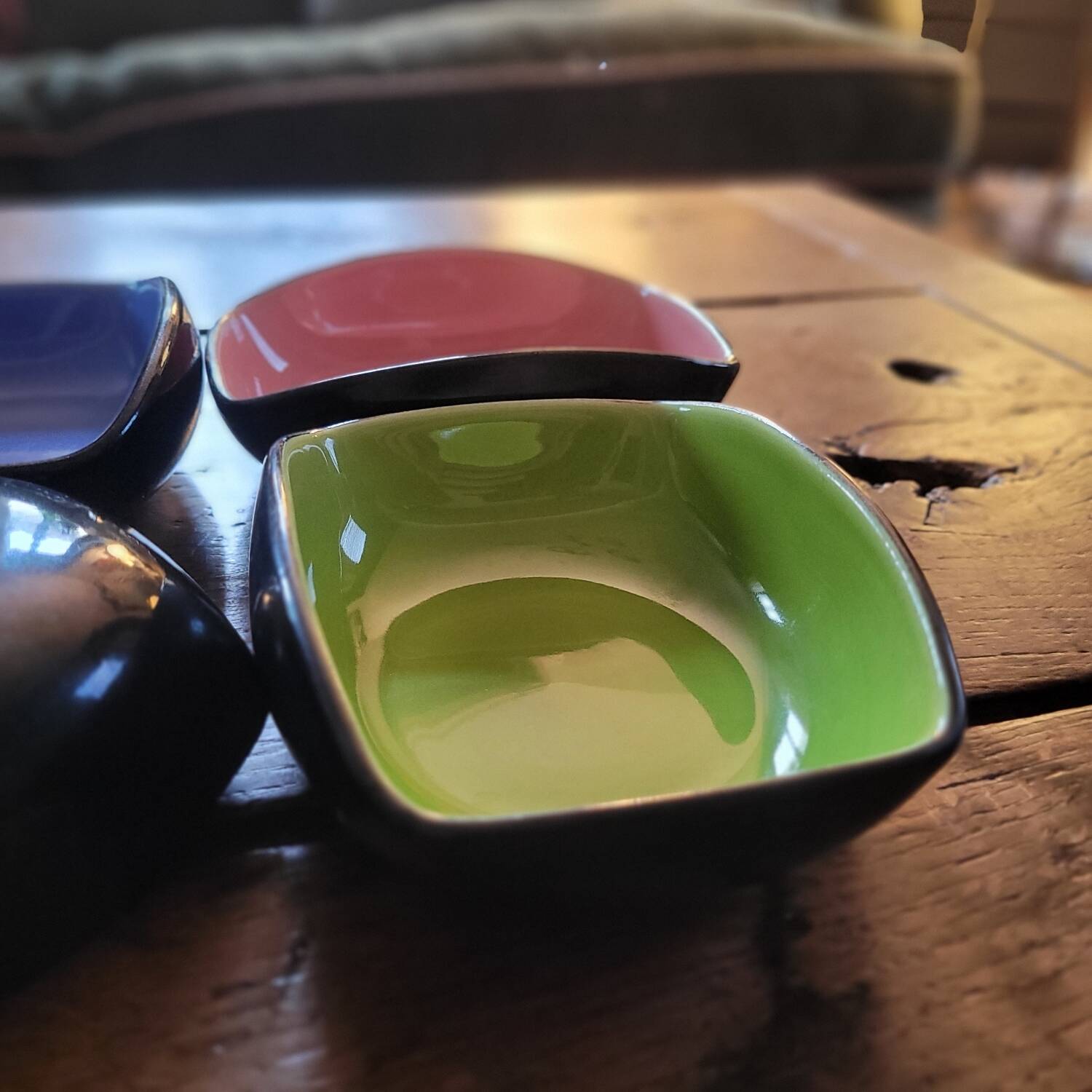 Set of 4 ceramic glazed multicoloured bowls/trinket dishes.