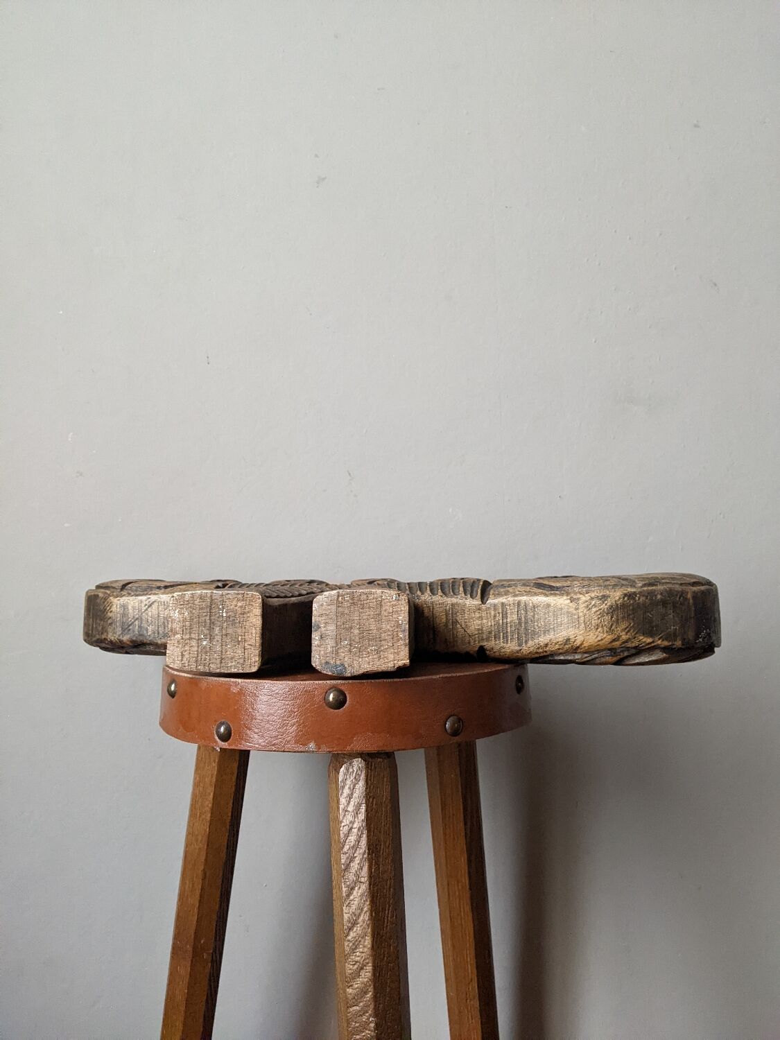 Hand-carved wooden candle holder, ethnic tribal style.