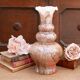 Fluted vase in mottled brown and white glass paste