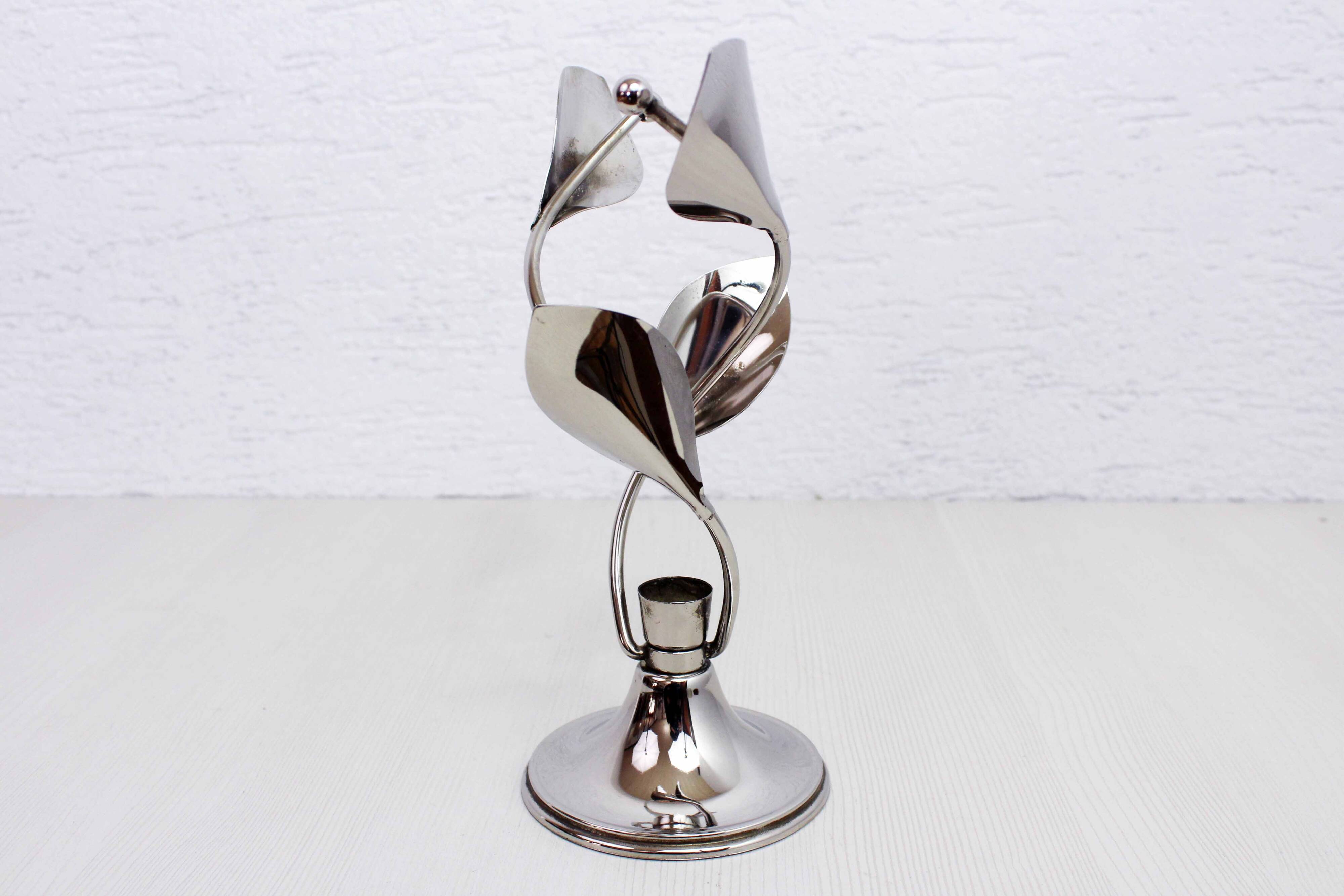 Chrome metal floral candle holder