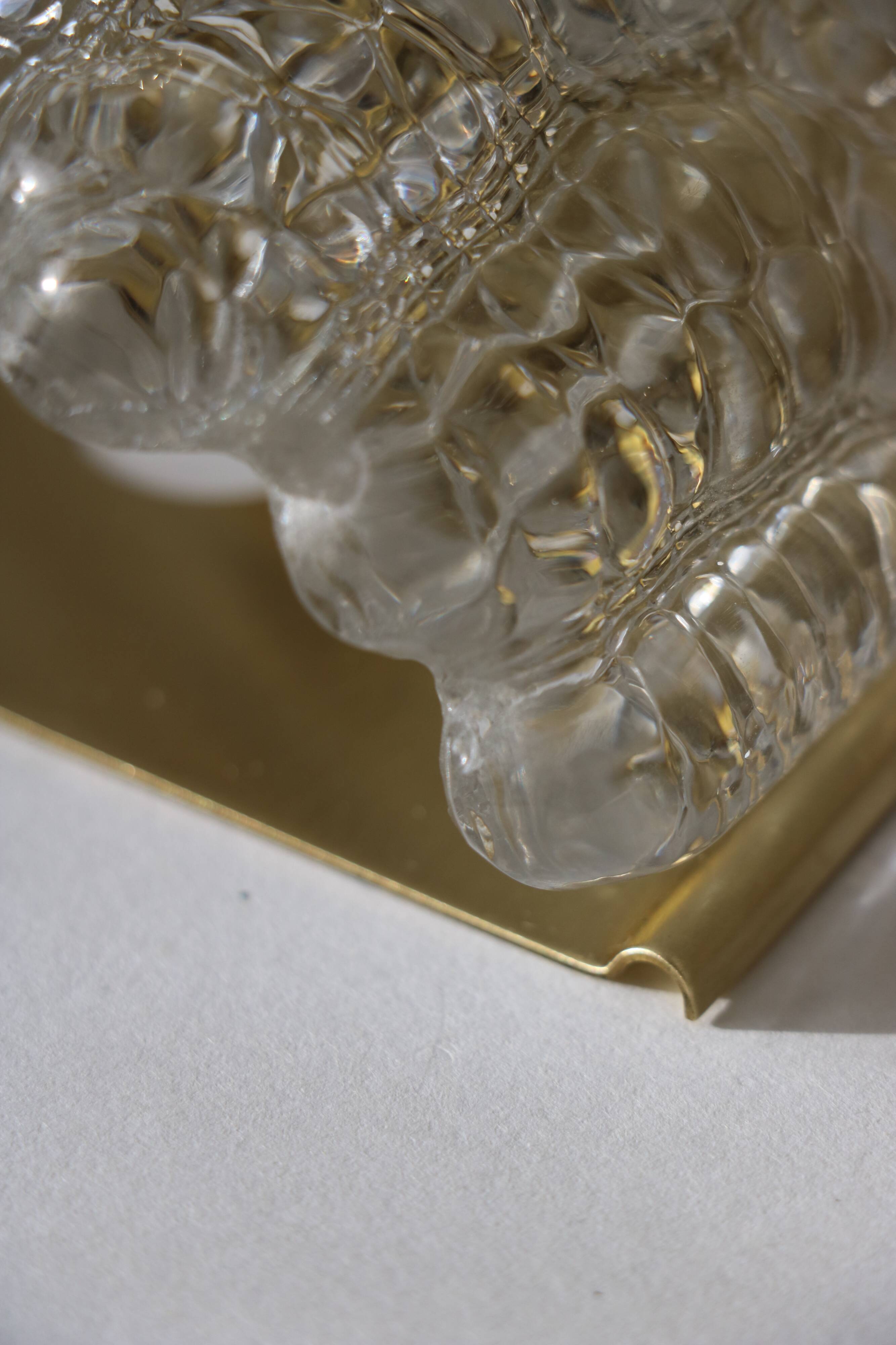 Pair of glass and brass wall lights by Carl Fagerlund for Orrefors, 1960.