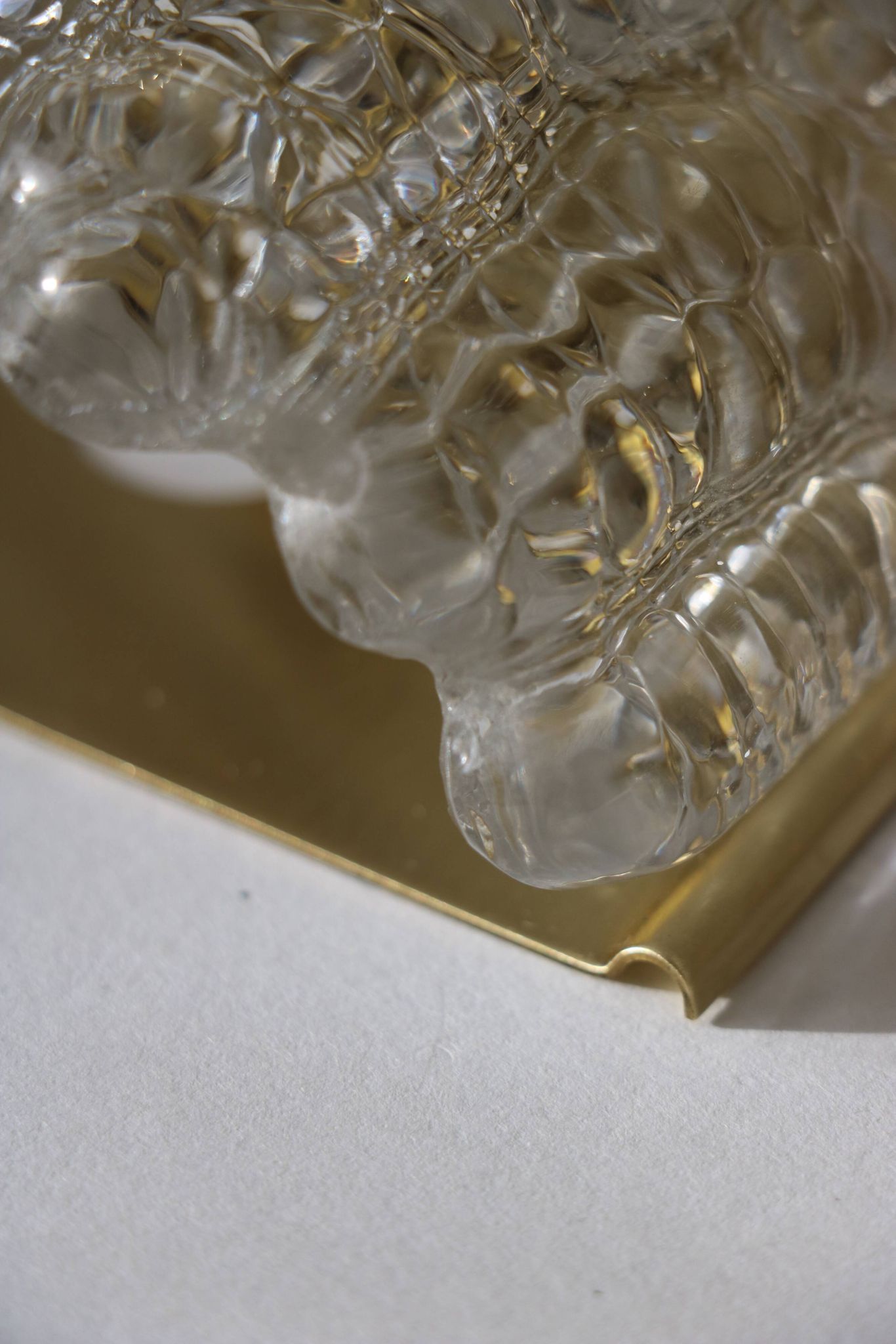 Pair of glass and brass wall lights by Carl Fagerlund for Orrefors, 1960.