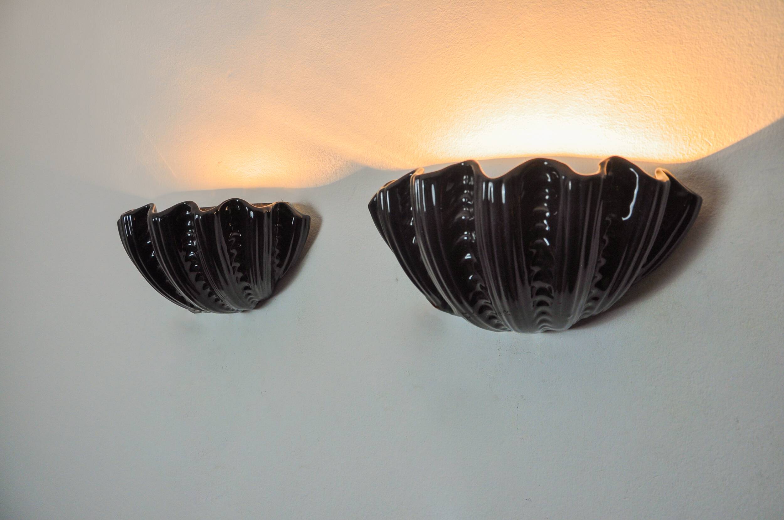 Pair of shell wall lights, black ceramic, Italy, 1970