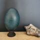 Emu egg naturally green / blue on dark wood bases