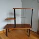 Shelf carries plants on feet modernist style