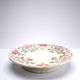 Short antique Longchamp stand with polychrome daisies in earthenware.