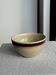 Large speckled beige salad bowl with ochre trim H14 D25