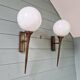 Pair of Art Deco wall sconces in brass and white opaline, 1930.