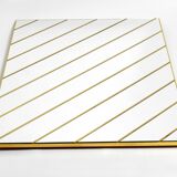Large, exceptional 1970s brass wall mirror with diagonal mirror strips