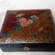 Old lacquered jewelry box with Asian decoration bird, flower, bee