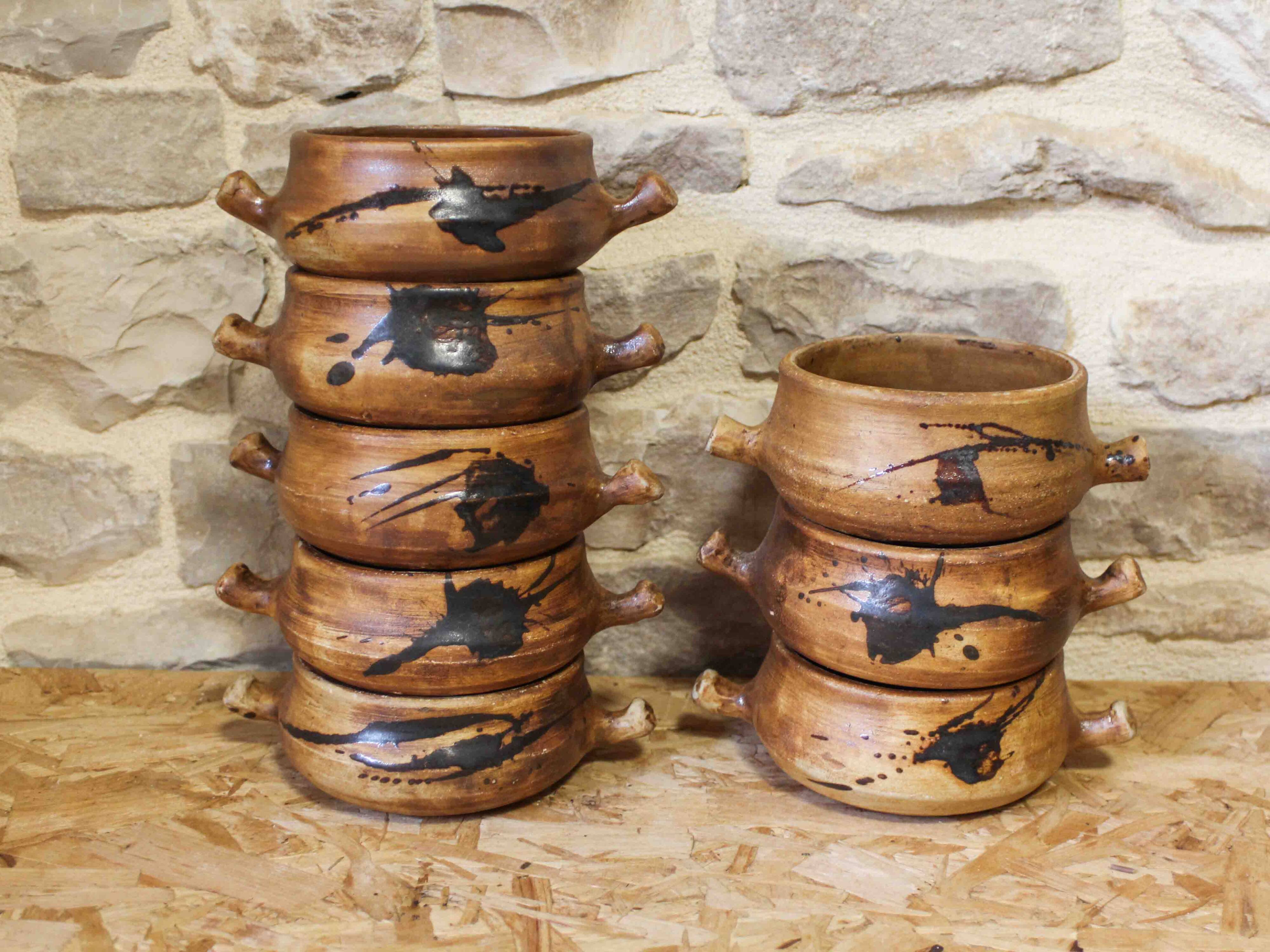 Set of 8 ceramic fondue pots from La Colombe pottery