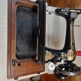 Ancienne machine à coudre Singer 27k