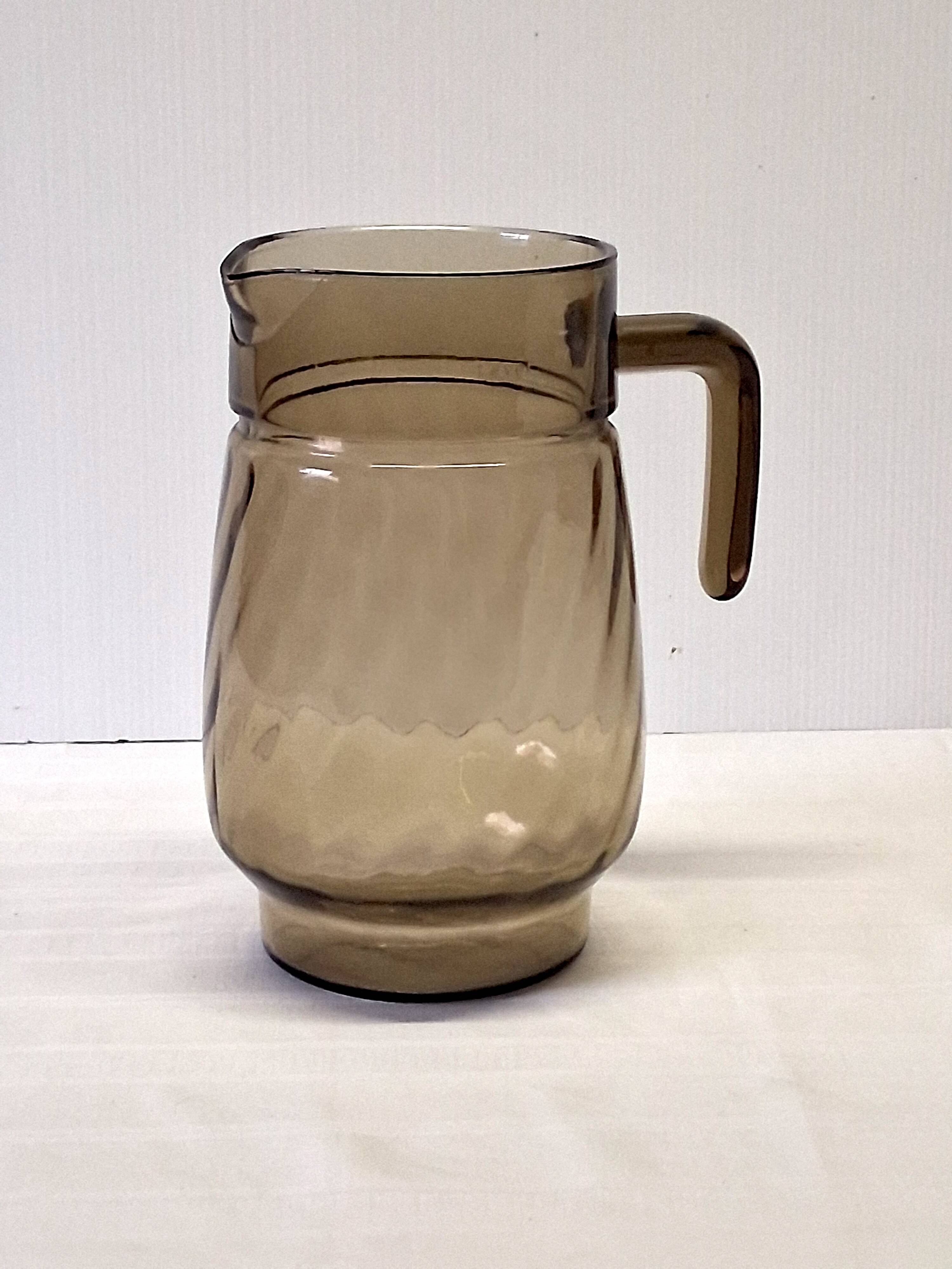 Very pretty black smoked glass pitcher from Lever in very good condition.
