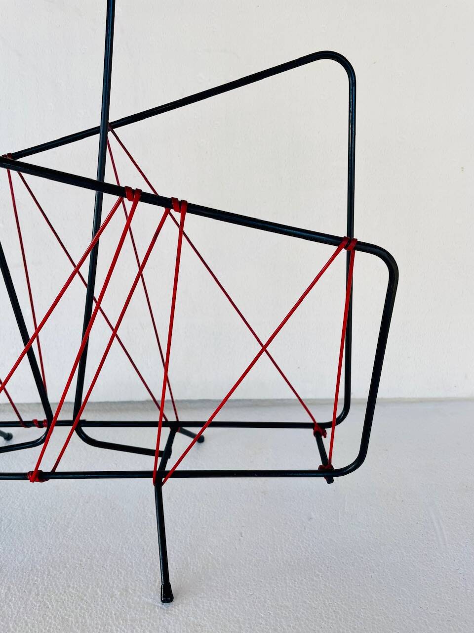 Vintage black metal magazine rack circa 19