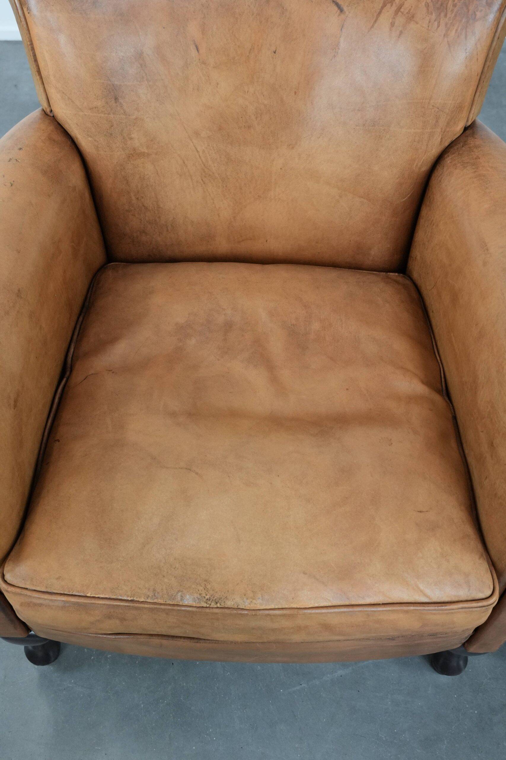 2 fauteuils vintage en cuir de mouton