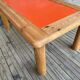 Modernist pine and orange lacquered coffee table, 1970s