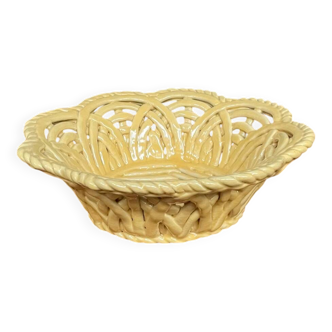 Yellow openwork woven earthenware basket