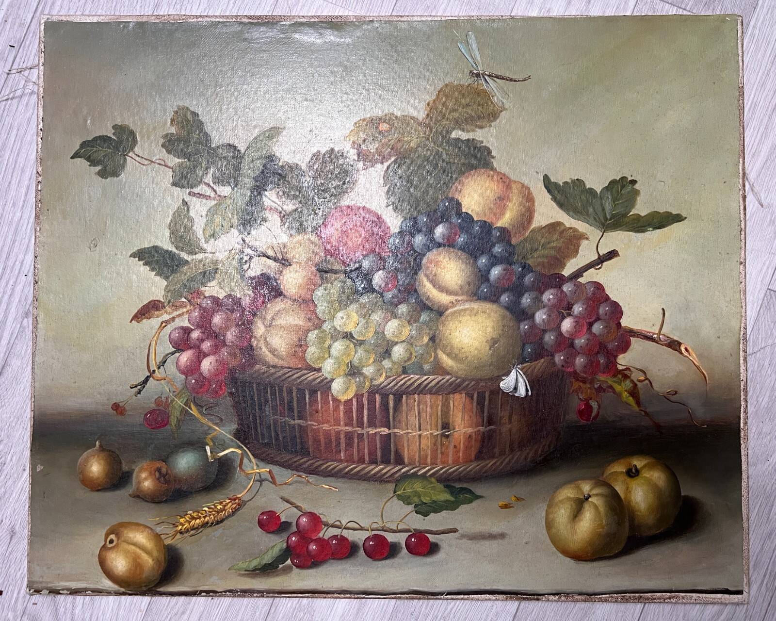 Still life painting of grapes and apples.