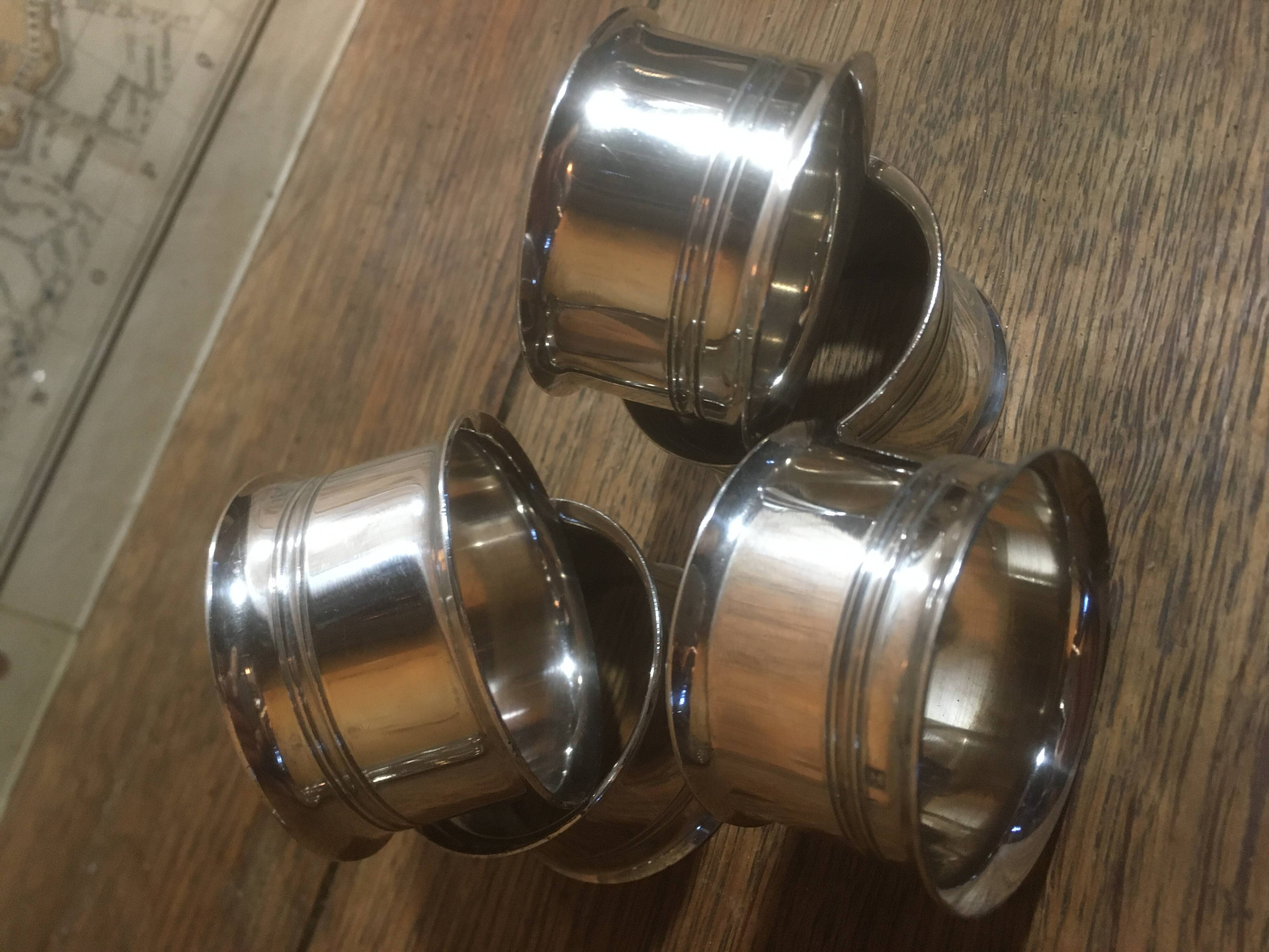 Set of 4 silver metal napkin rings