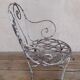 Fauteuil de jardin XIX° en fer forgé