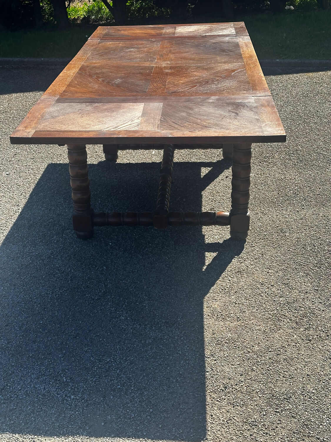Solid oak extendable table, turned legs – 19th century