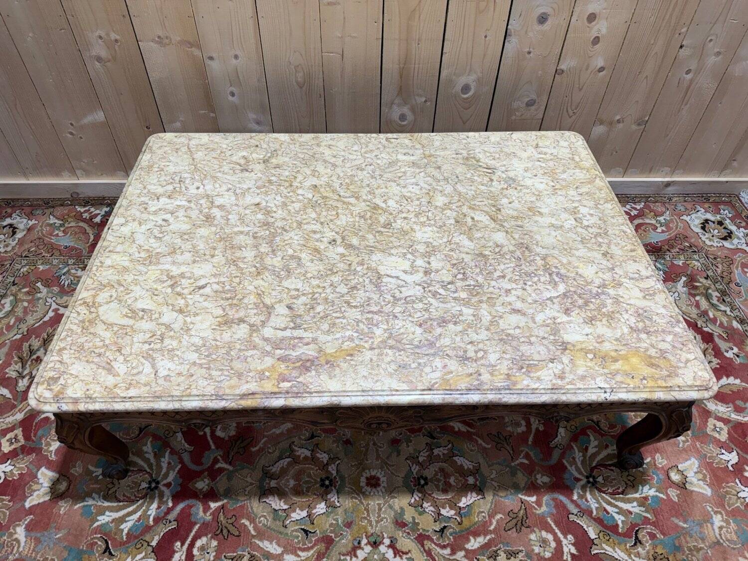 Louis XV style coffee table in walnut with a marble top.